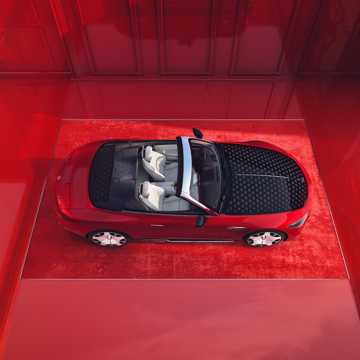 "Red Ambience" tasarım konseptine sahip açık Mercedes-Maybach SL 680 Monogram Serisinin üstten görünümü.
